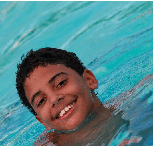 Child Learning To Swim With Custom Swim Program At Bear Paddle