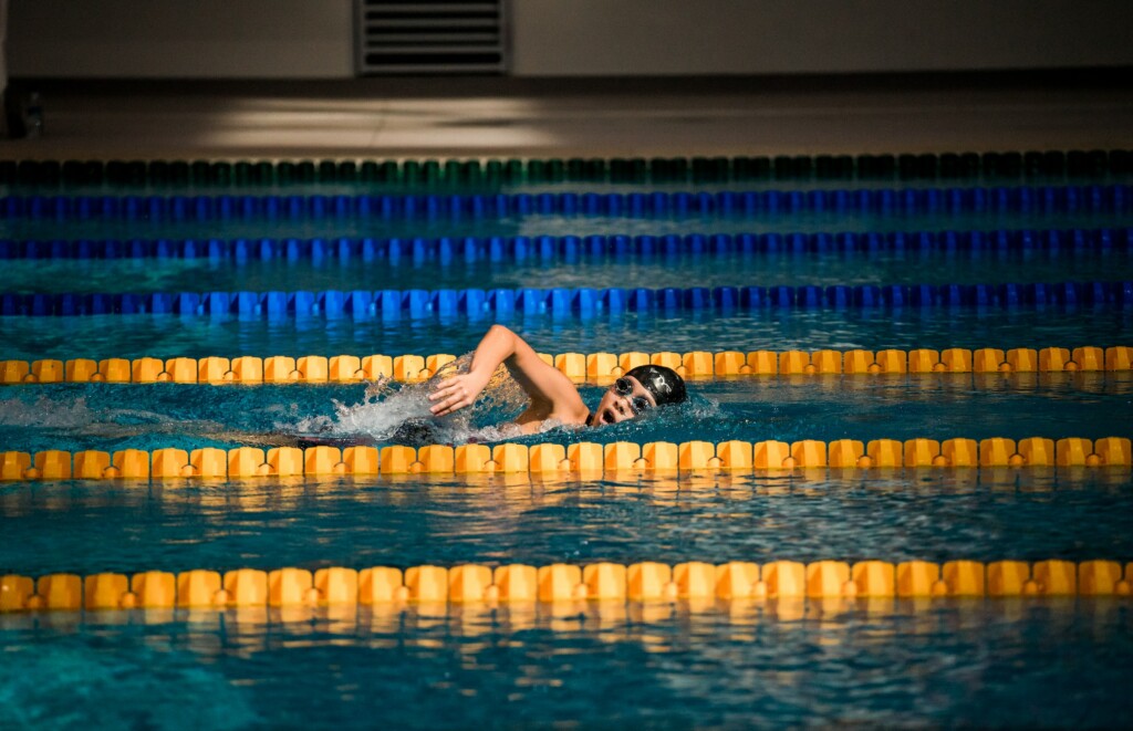 Kid swimming in pool