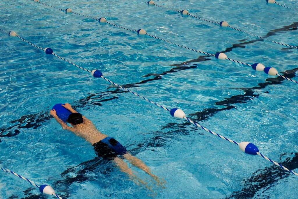 Boy swimming in pool